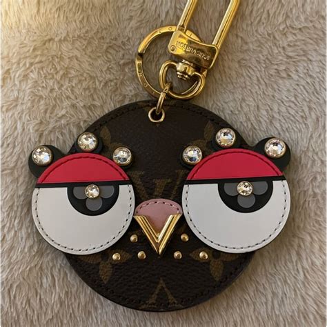 louis vuitton owl keychain|louis vuitton luggage key holder.